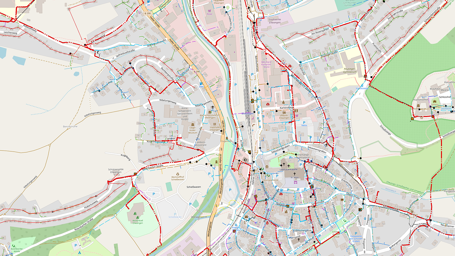 Luftaufnahme einer Stadt mit roten Markierungen 